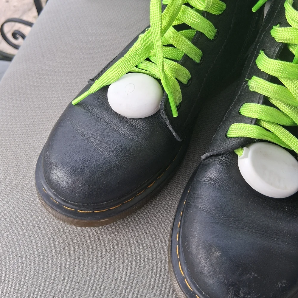 Dr. Martens Kids Black Boots with Bright Green Laces